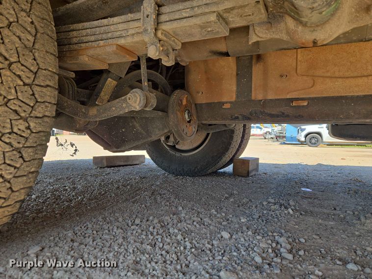 image for item EW0203 2022 Chevrolet Silverado 3500HD Crew Cab flatbed pickup truck
