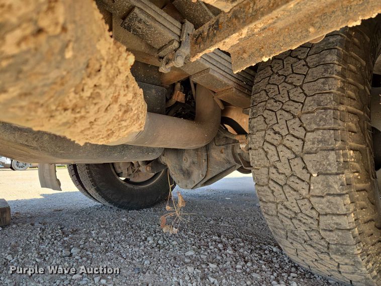 image for item EW0203 2022 Chevrolet Silverado 3500HD Crew Cab flatbed pickup truck