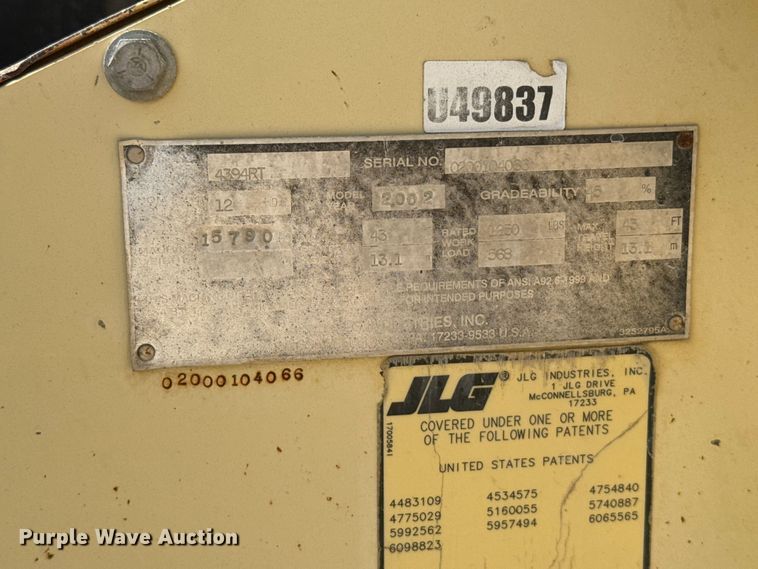 image for item EW4767 2002 JLG 4394RT scissor lift