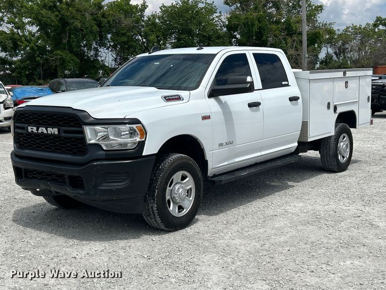 image for item FC2697 2022 RAM 2500 Crew Cab utility bed pickup truck