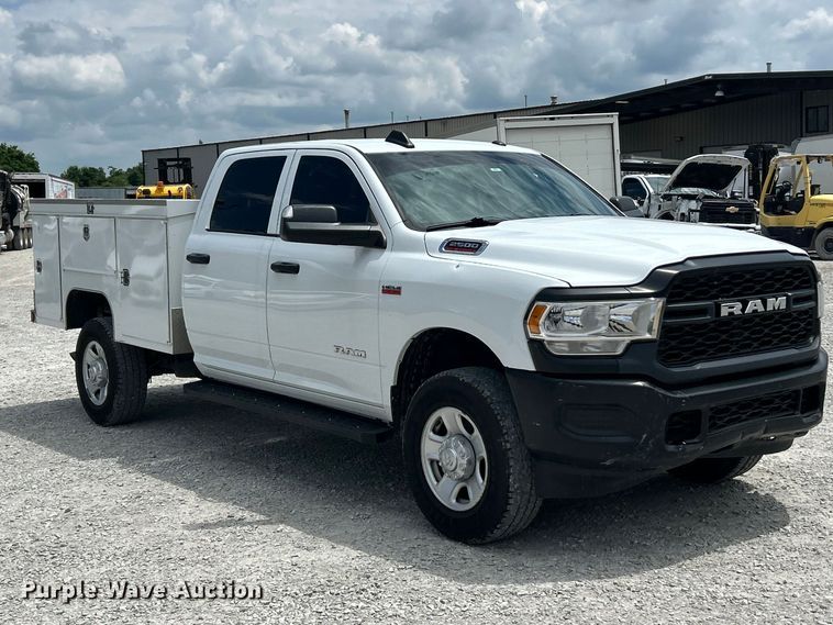 image for item FC2697 2022 RAM 2500 Crew Cab utility bed pickup truck