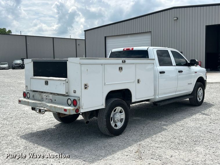 image for item FC2697 2022 RAM 2500 Crew Cab utility bed pickup truck