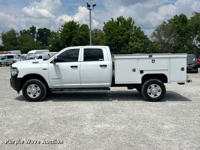 image for item FC2697 2022 RAM 2500 Crew Cab utility bed pickup truck