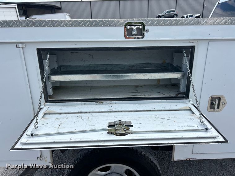image for item FC2697 2022 RAM 2500 Crew Cab utility bed pickup truck