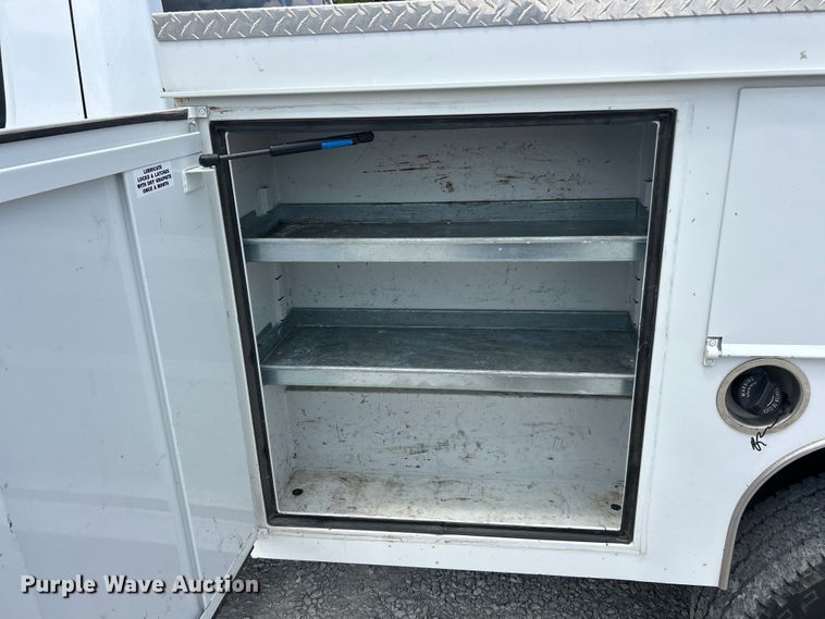 image for item FC2697 2022 RAM 2500 Crew Cab utility bed pickup truck