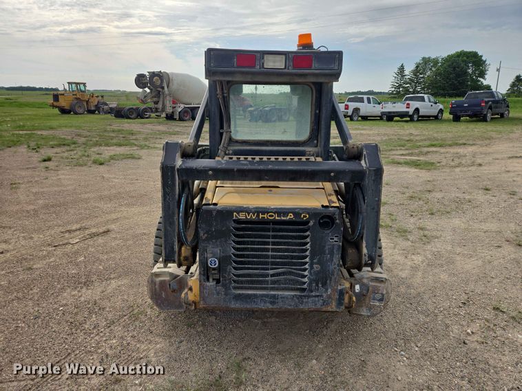 image for item ER1672 1999 New Holland LX665 skid steer loader