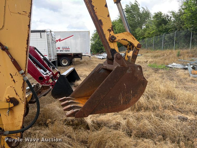 image for item ER3008 1997 New Holland 655E backhoe