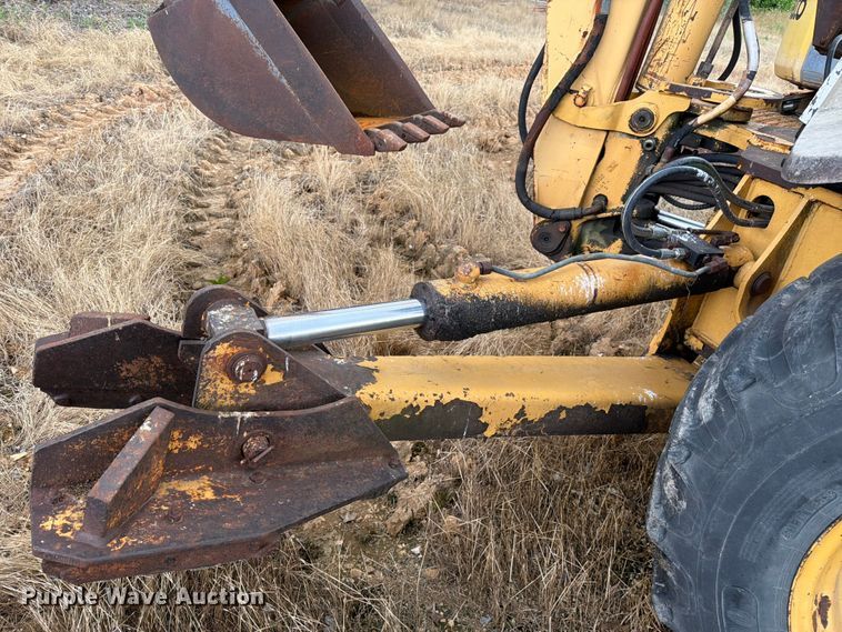 image for item ER3008 1997 New Holland 655E backhoe