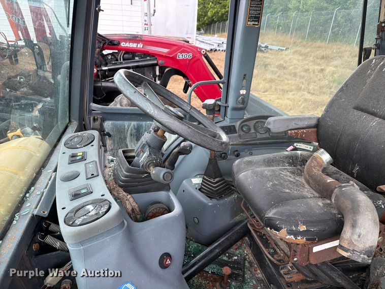 image for item ER3008 1997 New Holland 655E backhoe