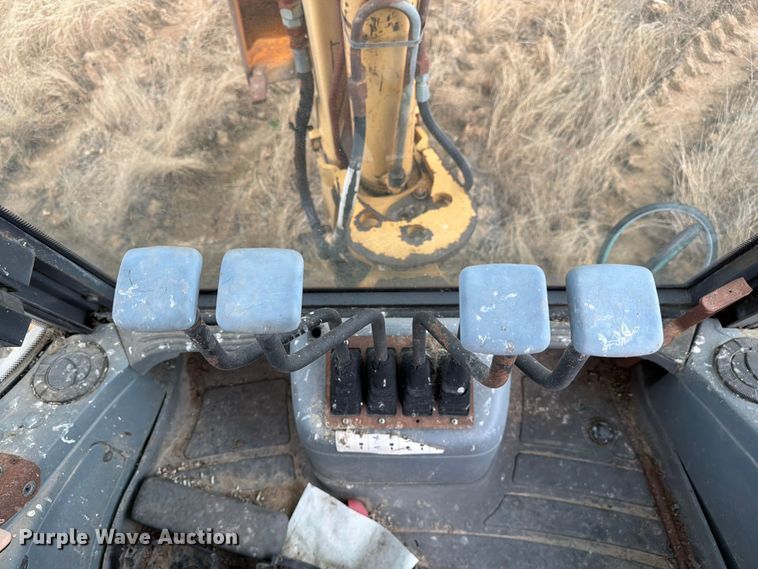 image for item ER3008 1997 New Holland 655E backhoe