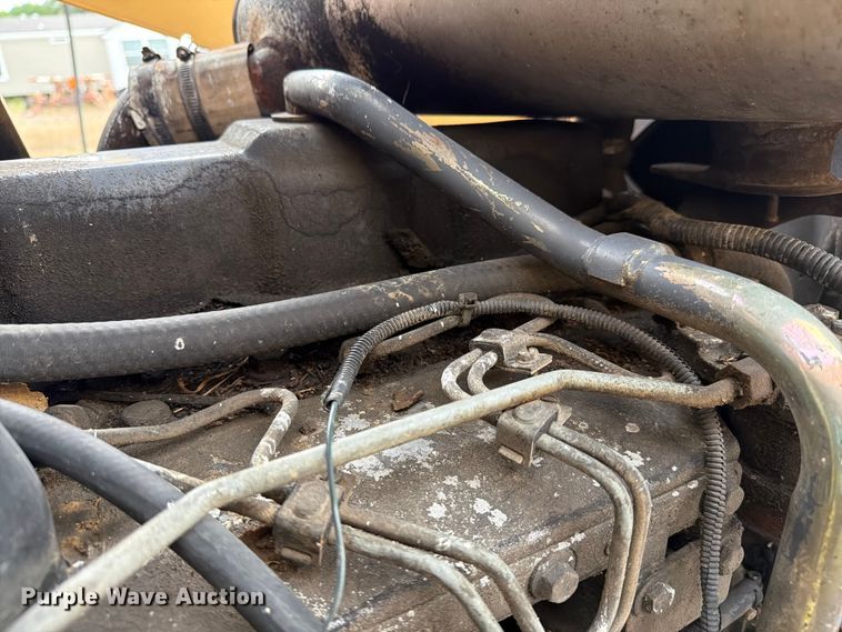 image for item ER3008 1997 New Holland 655E backhoe