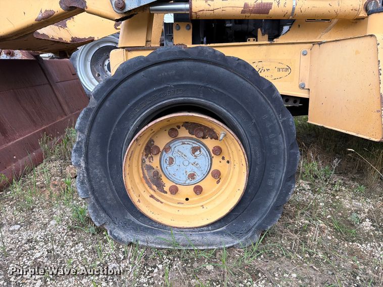 image for item ER3008 1997 New Holland 655E backhoe