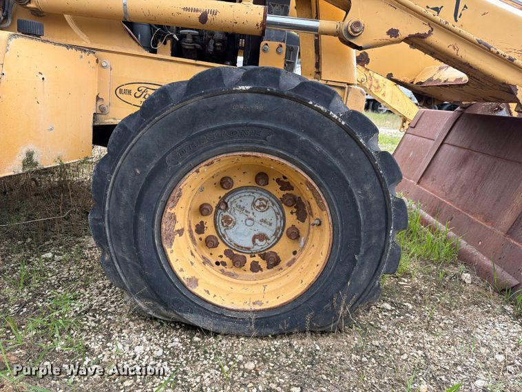 image for item ER3008 1997 New Holland 655E backhoe