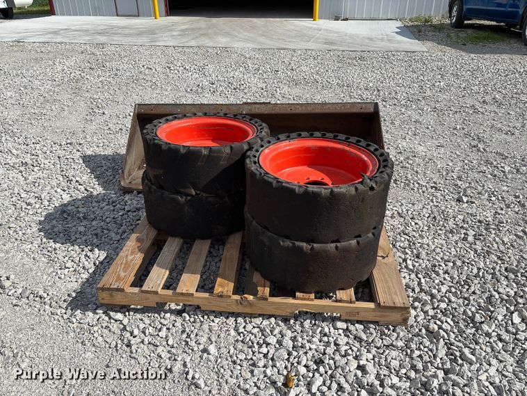 image for item FC5865 Skid steer bucket and tires
