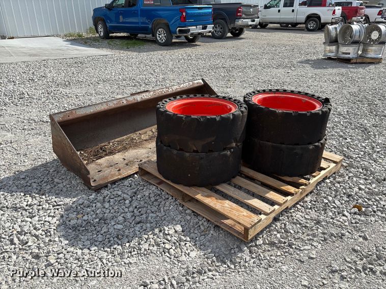 image for item FC5865 Skid steer bucket and tires