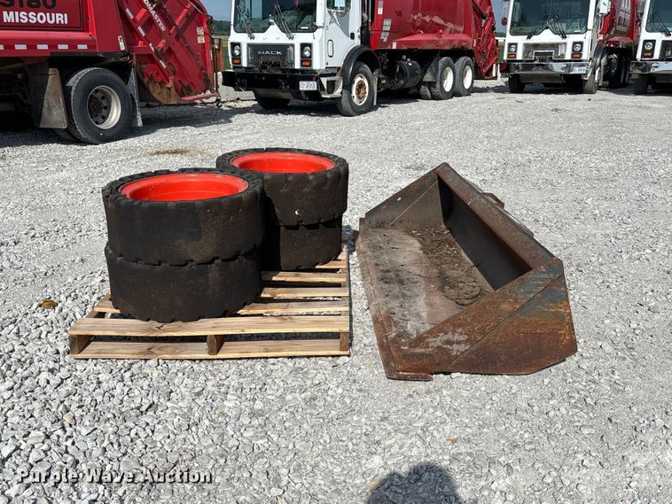 image for item FC5865 Skid steer bucket and tires