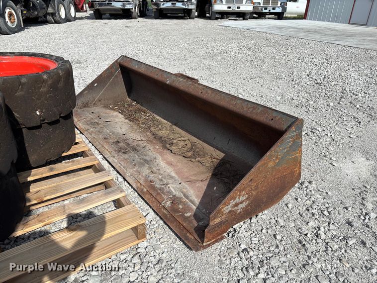 image for item FC5865 Skid steer bucket and tires