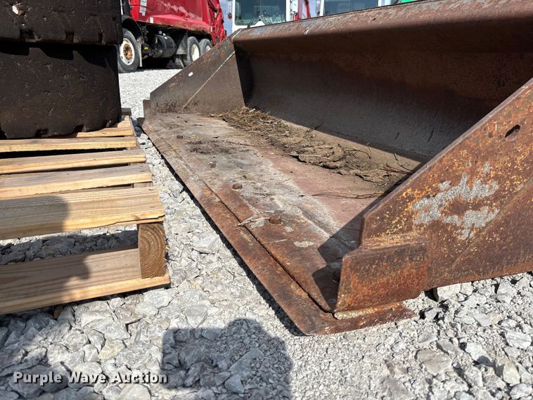 image for item FC5865 Skid steer bucket and tires