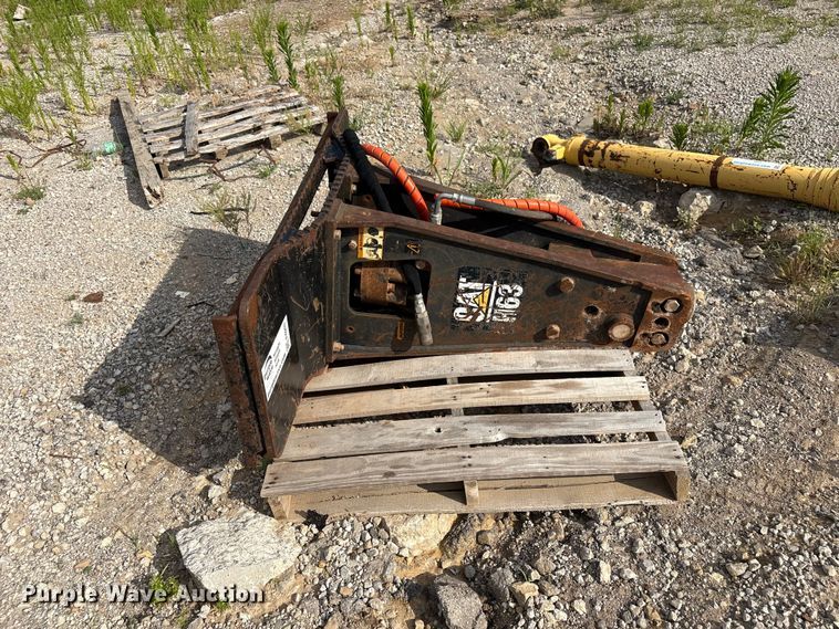 image for item FI0203 Caterpillar H63 skid steer breaker