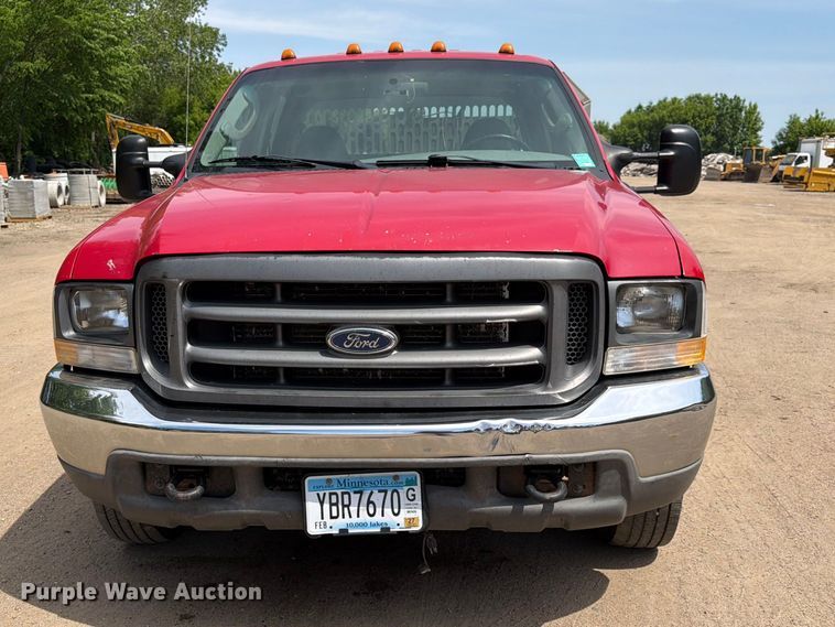image for item FK0210 2004 Ford F350 Super Duty Crew Cab flatbed pickup truck