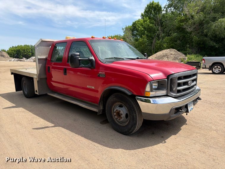 image for item FK0210 2004 Ford F350 Super Duty Crew Cab flatbed pickup truck