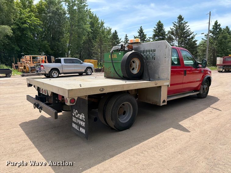 image for item FK0210 2004 Ford F350 Super Duty Crew Cab flatbed pickup truck