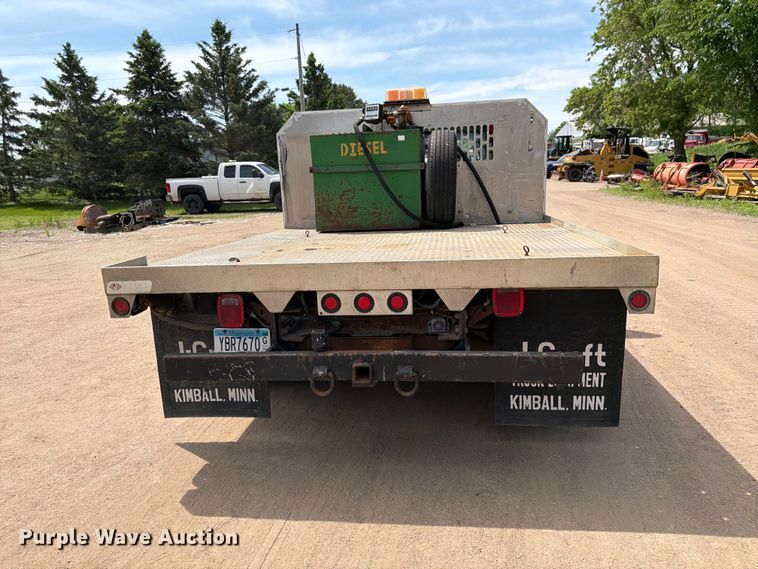 image for item FK0210 2004 Ford F350 Super Duty Crew Cab flatbed pickup truck