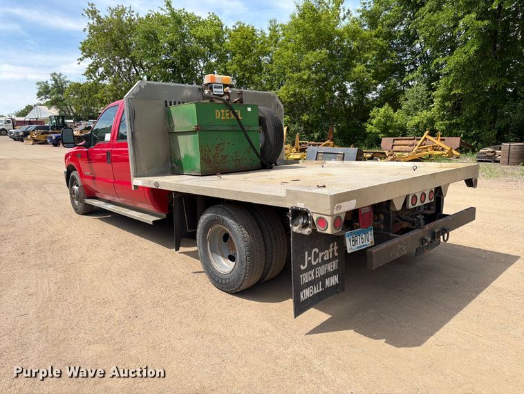 image for item FK0210 2004 Ford F350 Super Duty Crew Cab flatbed pickup truck