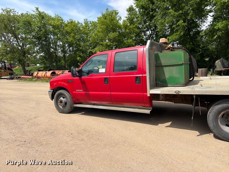 image for item FK0210 2004 Ford F350 Super Duty Crew Cab flatbed pickup truck