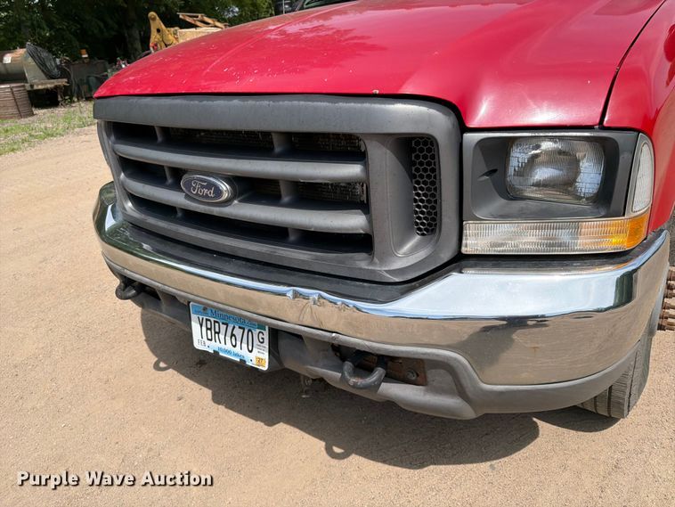 image for item FK0210 2004 Ford F350 Super Duty Crew Cab flatbed pickup truck