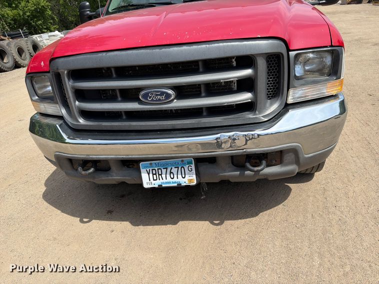 image for item FK0210 2004 Ford F350 Super Duty Crew Cab flatbed pickup truck