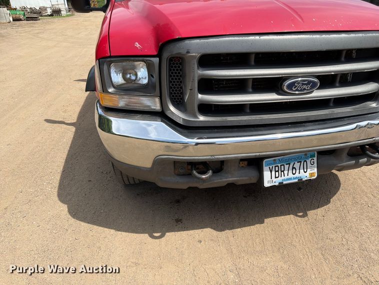 image for item FK0210 2004 Ford F350 Super Duty Crew Cab flatbed pickup truck