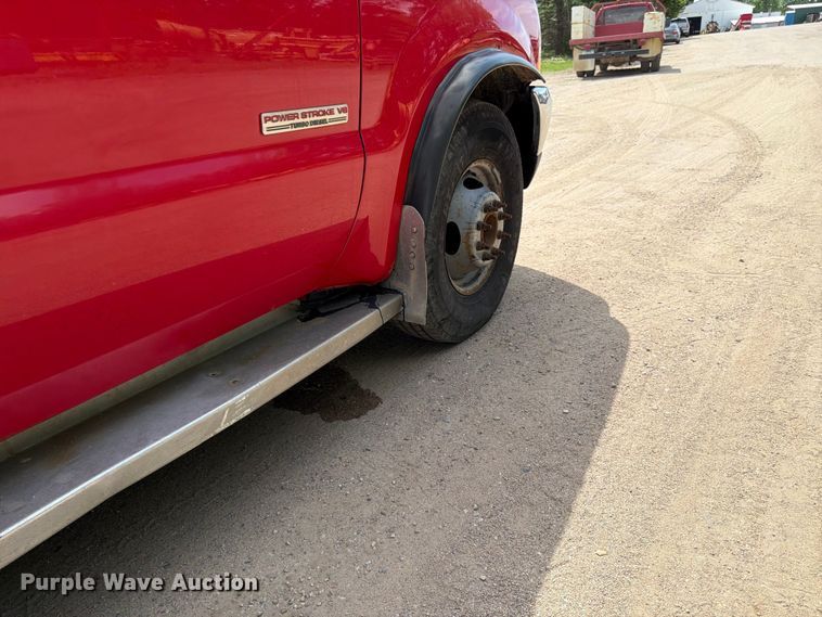 image for item FK0210 2004 Ford F350 Super Duty Crew Cab flatbed pickup truck