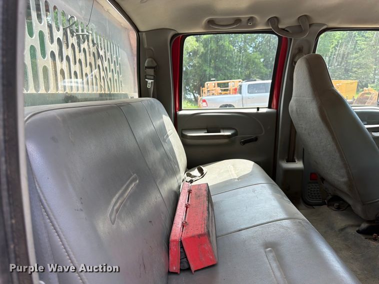 image for item FK0210 2004 Ford F350 Super Duty Crew Cab flatbed pickup truck