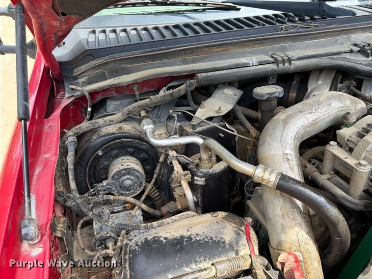 image for item FK0210 2004 Ford F350 Super Duty Crew Cab flatbed pickup truck