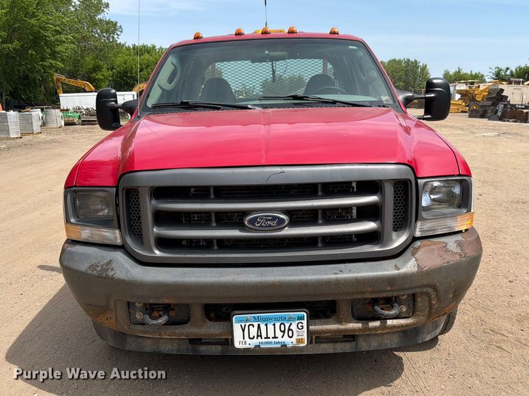 image for item FK0211 2004 Ford F350 Super Duty Crew Cab flatbed pickup truck