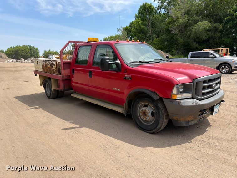 image for item FK0211 2004 Ford F350 Super Duty Crew Cab flatbed pickup truck