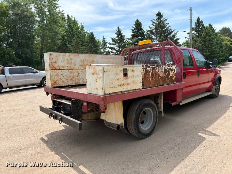 image for item FK0211 2004 Ford F350 Super Duty Crew Cab flatbed pickup truck