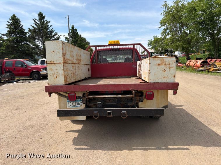 image for item FK0211 2004 Ford F350 Super Duty Crew Cab flatbed pickup truck