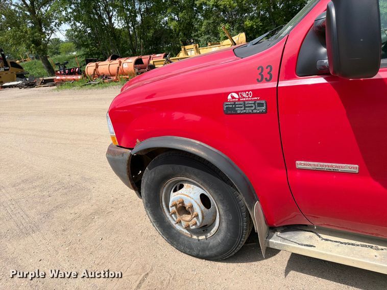 image for item FK0211 2004 Ford F350 Super Duty Crew Cab flatbed pickup truck