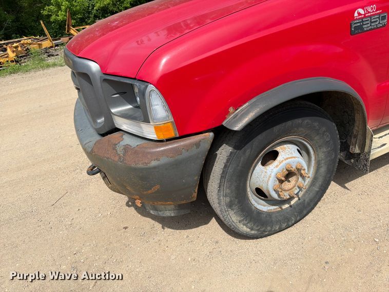 image for item FK0211 2004 Ford F350 Super Duty Crew Cab flatbed pickup truck