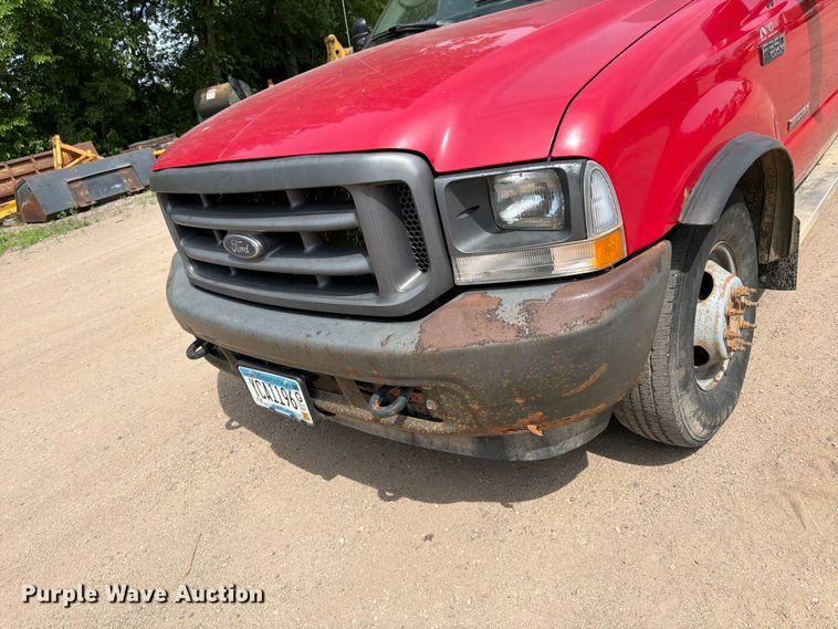 image for item FK0211 2004 Ford F350 Super Duty Crew Cab flatbed pickup truck