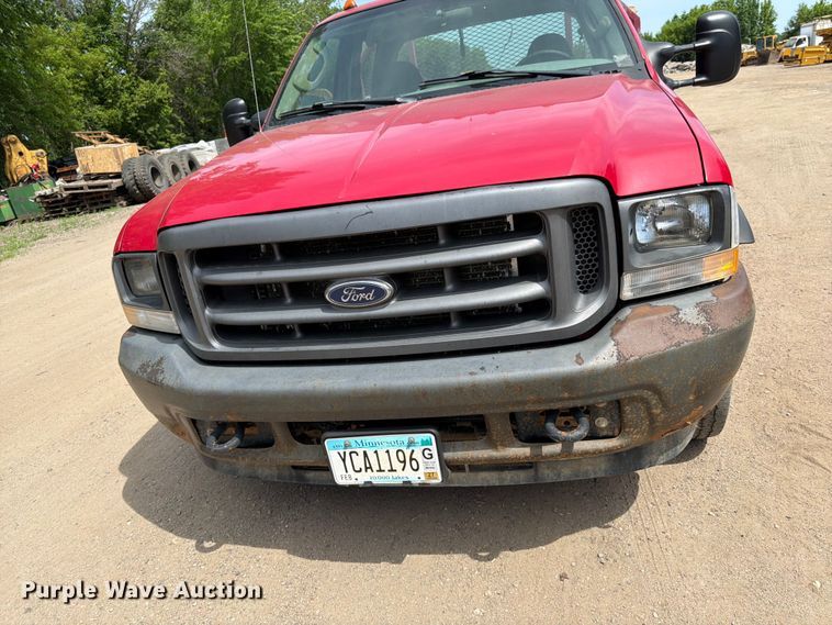 image for item FK0211 2004 Ford F350 Super Duty Crew Cab flatbed pickup truck