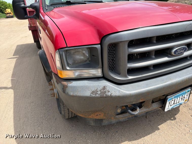 image for item FK0211 2004 Ford F350 Super Duty Crew Cab flatbed pickup truck