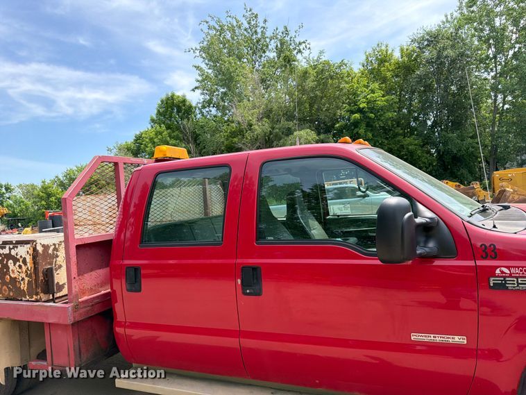 image for item FK0211 2004 Ford F350 Super Duty Crew Cab flatbed pickup truck