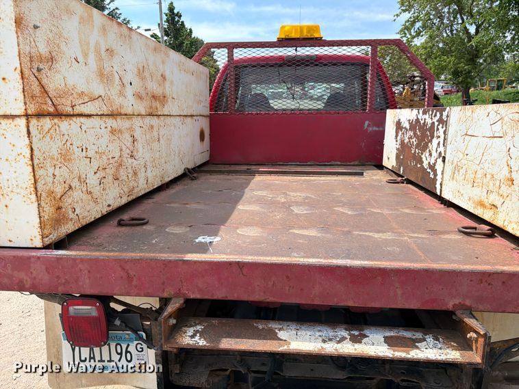 image for item FK0211 2004 Ford F350 Super Duty Crew Cab flatbed pickup truck