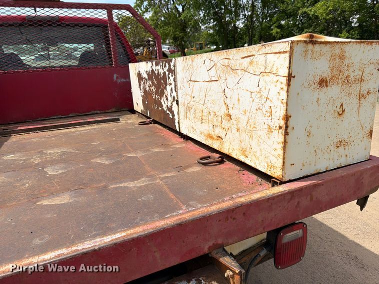 image for item FK0211 2004 Ford F350 Super Duty Crew Cab flatbed pickup truck