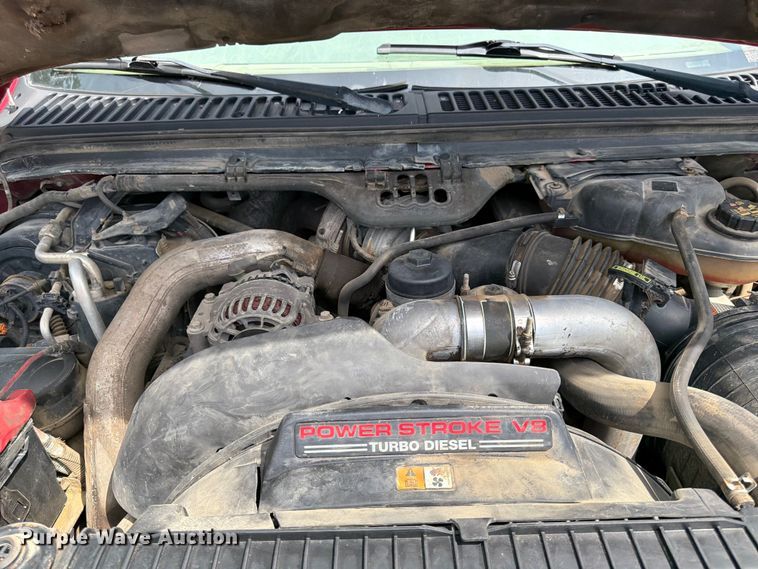 image for item FK0211 2004 Ford F350 Super Duty Crew Cab flatbed pickup truck