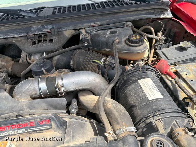image for item FK0211 2004 Ford F350 Super Duty Crew Cab flatbed pickup truck