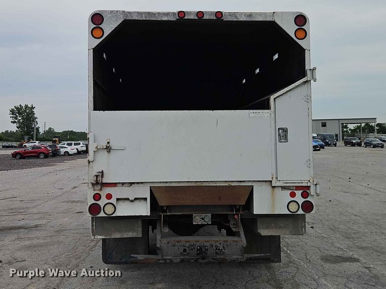 image for item YA3299 2015 Ford F750 Super Duty chipper truck